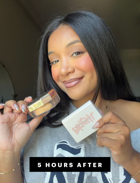 Bianca Richards holding up Fenty powders